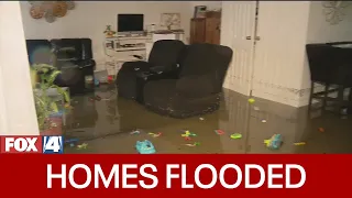 Flooding damages homes, swallows cars in Tarrant County.