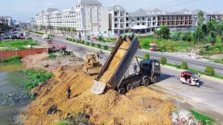 First Start open New Project! Land fill up Processing Dump truck with stronger Dozer push into water