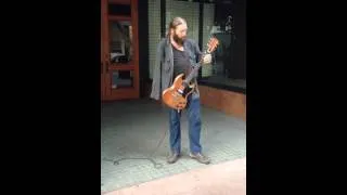 One handed guitar player