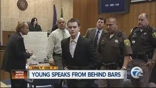 Young speaks from behind bars