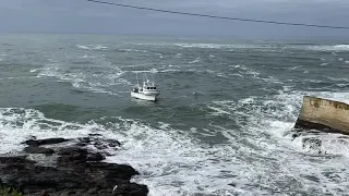 Charter boat inbound Depoe Bay Channel