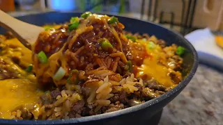 Add ground beef & rice to one pan for an AMAZING Enchilada Rice Casserole!