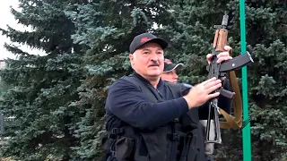 Lukashenko seen with rifle as thousands of Belarusians take to the streets in protest