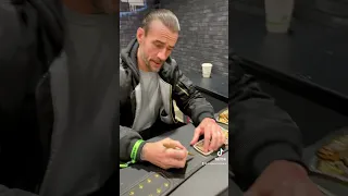 MADE CM PUNK SIGN A WWE BELT!!!