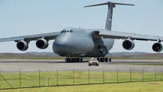 US 420 Ton C-5 Galaxy Plane Guided by Small Car on Runway