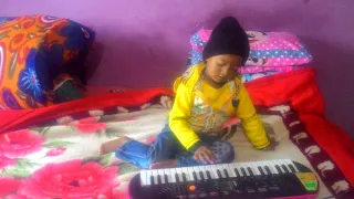 Amazing 3 year child play.( sa re ga ma pa)