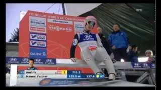 Manuel Fettner balancing on one ski at World Ski Championships 2013 in Val di Fiemme