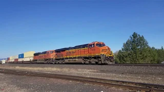 UNIT #7469 of the BNSF fleet leads a mostly double stacks with GM end through the curve & C Falls MT