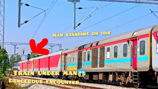 "HO MY GOD" VERY DANGEROUS ENCOUNTER 😱 MAN STANDING ON OHE WIRE WHILE TRAIN PASSES UNDER HIM 😱😱