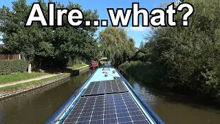 226. Narrowboat cruising through a village with an unpronounceable name