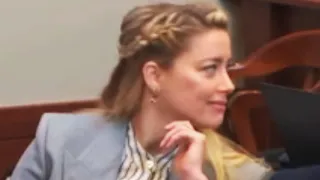 Amber Heard SMIRKING when Caught by Johnny Depp lawyer Camille