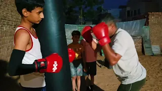 Fake Body jab, Right Hook to Head, Roll