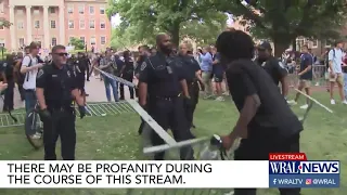 Officer slaps at protester's megaphone during UNC-Chapel Hill protest