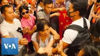Hong Kong Police Break Up Scuffles Between Pro- Beijing, Anti-Government Protesters