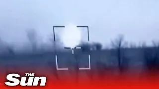 'Ukrainian marksman' cheers as he 'blows up Russian tank'