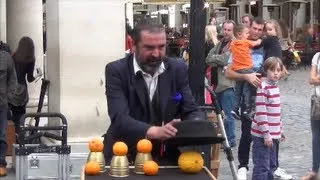 The trick of the Three Cups. Magic Show. London Street Performer.