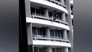Woman falls to her death while sitting on 27th floor balcony railing for a selfie
