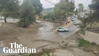 Flood water blocks road in north-east Spain amid rain alert