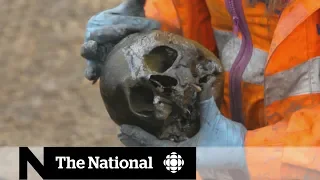 Archaeologists uncover 40,000 skeletons in U.K. railway dig