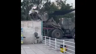 People Throw Debris At Israeli Armored Vehicles in Jenin