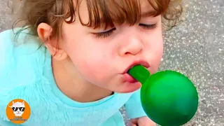 Most Adorable Baby Struggling to Attempt Balloon Inflate || Just Funniest