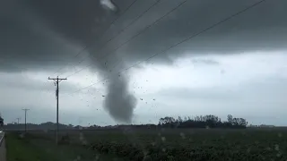 Video footage shows tornado destroying building in Illinois, U S