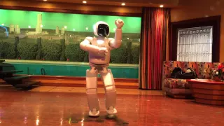 Asimo dancing. This is a robot created by Honda and you can see at Disneyland Innovation.