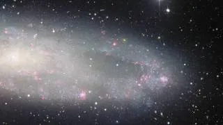 ESO: Panning Across Spiral Galaxy NGC 247 [720p]