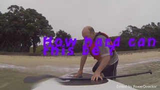 Fat old man first time on a paddle board