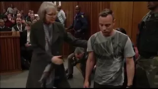 Oscar Pistorius stuns court by removing prosthetic legs and hobbling through room during sentencing