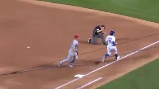 Umpire gets hit in face on errant throw to first base 9/13/21