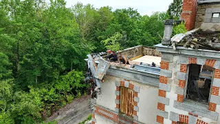 Removing the old zinc gutter ready for the roof.