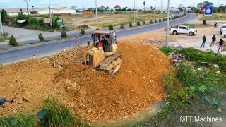 Full Action Fill The Land !! Power Strong Old KOMATSU Bulldozer Pushing Stone Into Water With Trucks