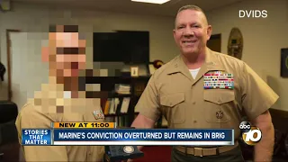 A Marine Colonel's conviction was overturned, but he remains in the brig