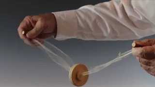 23 spinning disk on a string
