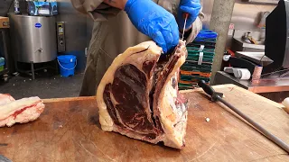 London Butcher in a Street Food Market. A Look Into a Butcher's Shop Of English Beef from Yorkshire