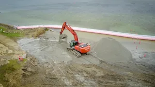 The use of flood barriers as a cofferdam for expansion of beach and recreational area!
