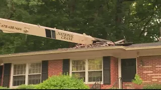 Decatur home damaged after crane falls over, authorities say