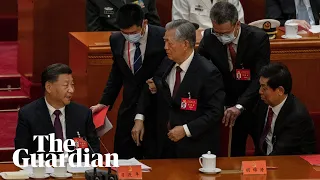 Former Chinese president Hu Jintao unexpectedly led out of party congress