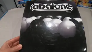 Abalone - Comment jouer une partie du jeu de billes avec règle du jeu .