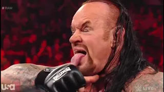 Undertaker returns to save Roman Reigns