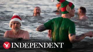 Swimmers enjoy Christmas Day dips across the UK
