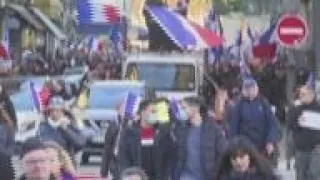 Thousands protest in Paris against virus measures