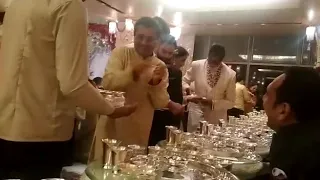 Amitabh Bachchan serving food at Isha Ambani's wedding