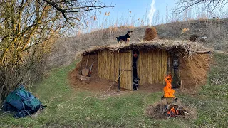 Building an earthen shelter in a clay mountain | Warm fireplace and reed roof