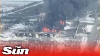 Ukrainian forces blow up Russian ammo depot in huge explosion