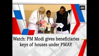 Watch: PM Modi gives beneficiaries keys of houses under PMAY