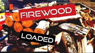Filling the dump trailer full of firewood.  Wolfe Ridge 28 Pro log splitter in action!