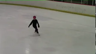 Double Salchow in progress by 6 year old