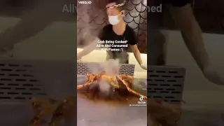this crab is cooked alive and eaten in flame